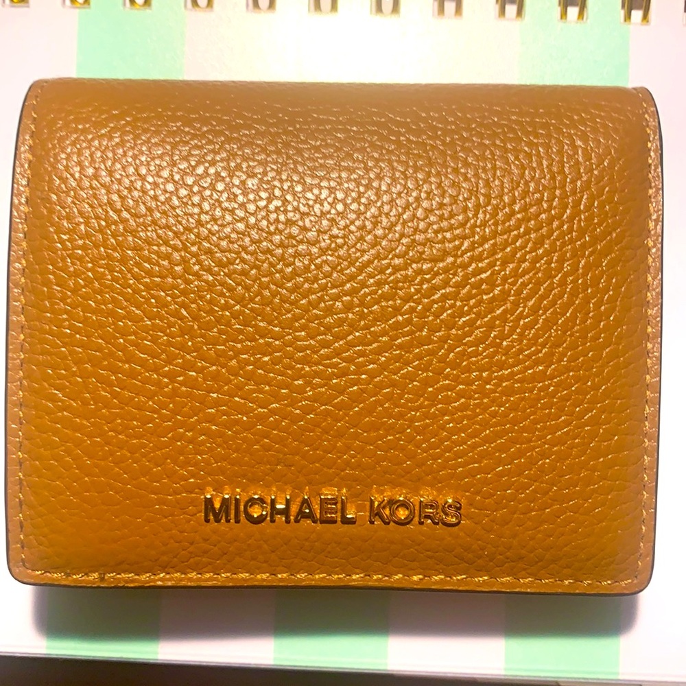 Brand new, never used Michael Kors woman’s wallet!